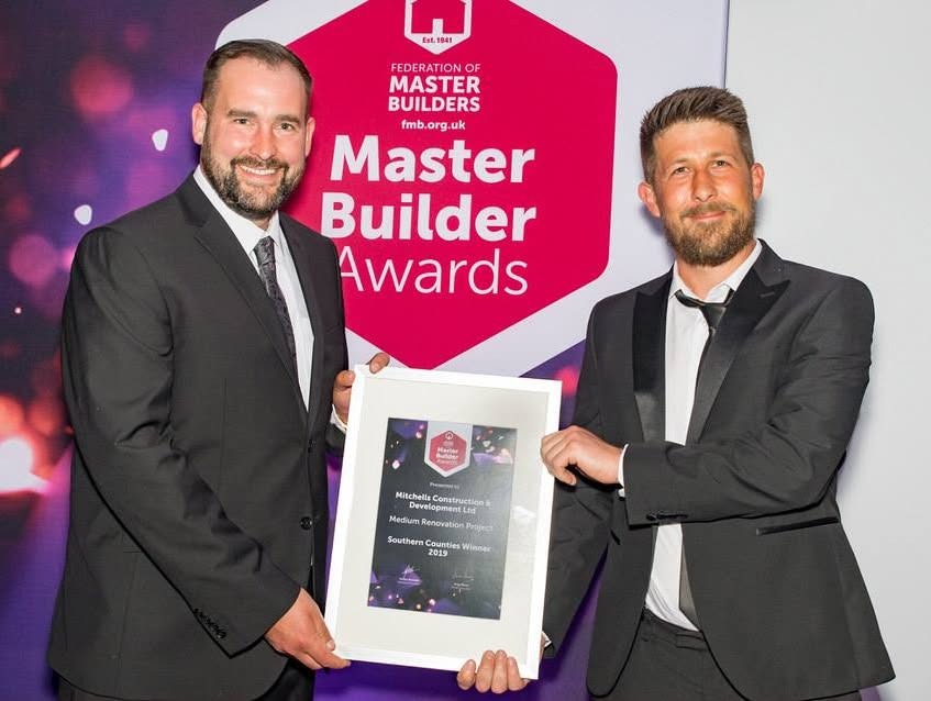 Mitchells Construction receiving the 2019 FMB Southern Counties Medium Renovation Project award